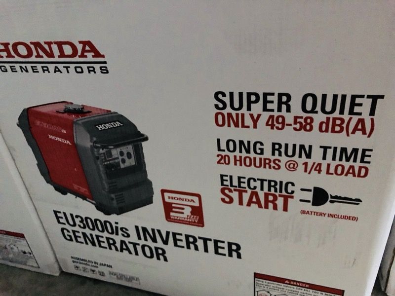 Honda EU3000is inverter generator with wheel kit and cover