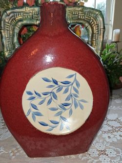 Red Ceramic Vase with Blue Leaf Medallion