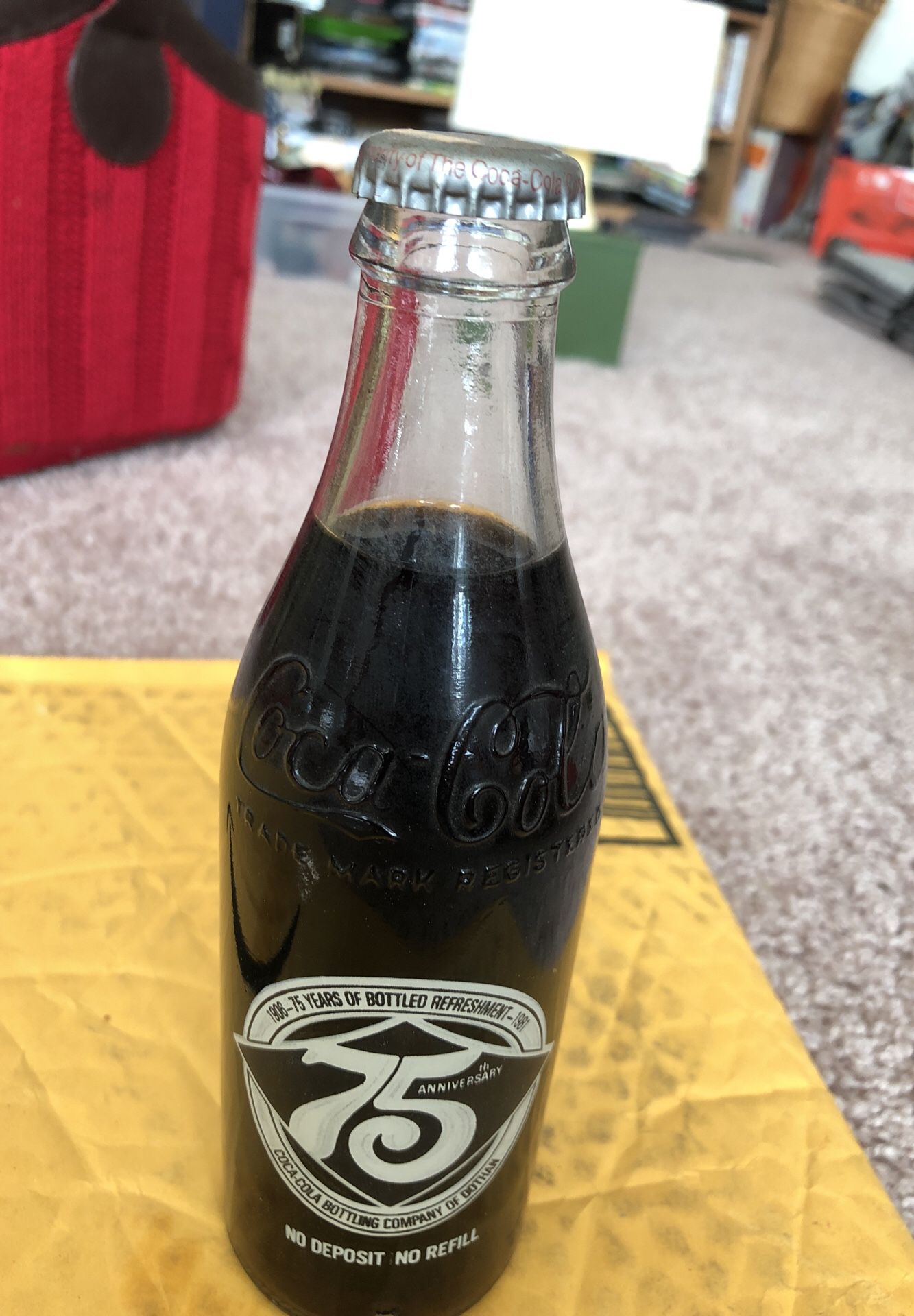 Collectible 43 year old Coca-Cola bottle commemorating 75th Anniversary of Coca-Cola history in 1975 Make offer