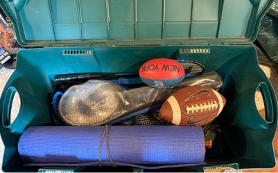 Large bin of sports equipment