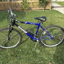 26” Magna Great Divide Mountain Bike, 18 speed & comes with a bottle holder, used in great condition
