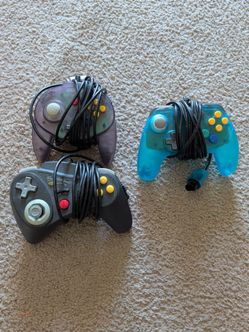 Lot of 3 Nintendo 64 style Controllers