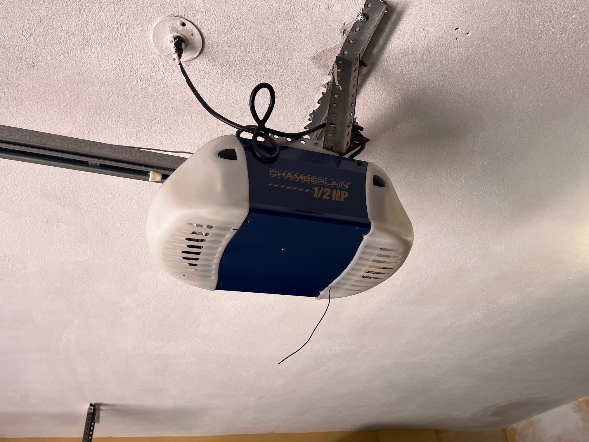 Garage Door Opener Broken Spring Off Track Replace Adjustment And Parts