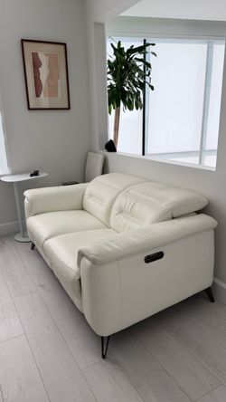 White leather power reclining sofa