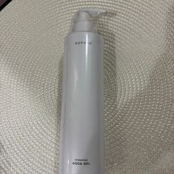 Bottle of the NuFACE Hydrating Aqua Gel Activator