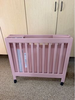 Babyletto portable crib, brand new out of the box never used.