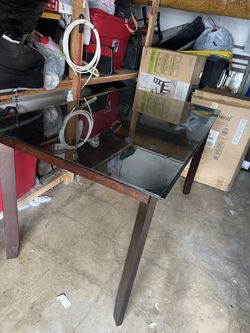 Table And Three Chairs 