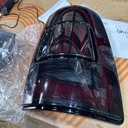 LED Tail Lights Compatible With Dodge RAM 1500 2500 3500 2009-2018 Reverse Brake Turn Signal Lights with Start-up Sequence(Smoke and Red)