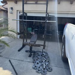 Rogue s-2 squat rack/ Bench press with 7ft 45lbs bar plus 255lbs of Olympic weights and curl bar