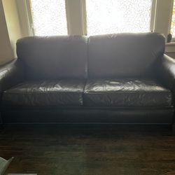 Full real leather couch about 6 feet normal wear pics shown 