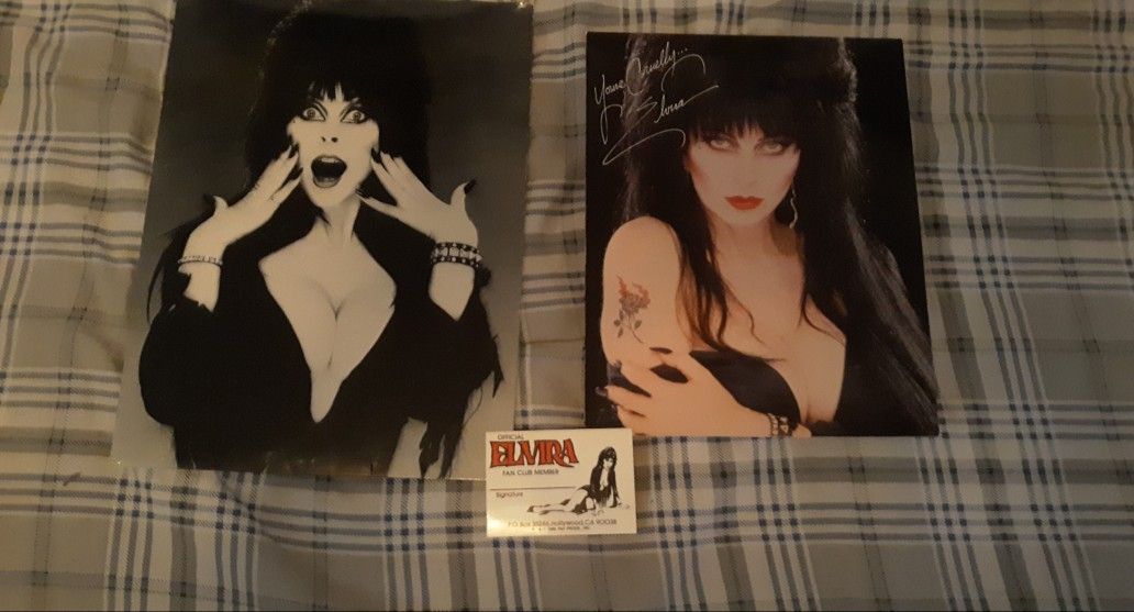 Elvira fan club picture with folder.