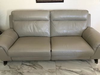 Leather love sofa recline back