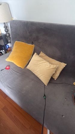 Futon with pillows
