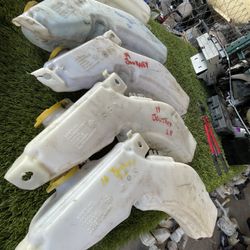 Journey windshield washer reservoirs