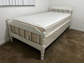 Twin bed with box spring and mattress