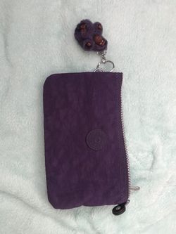 Purple Kipling wristlet