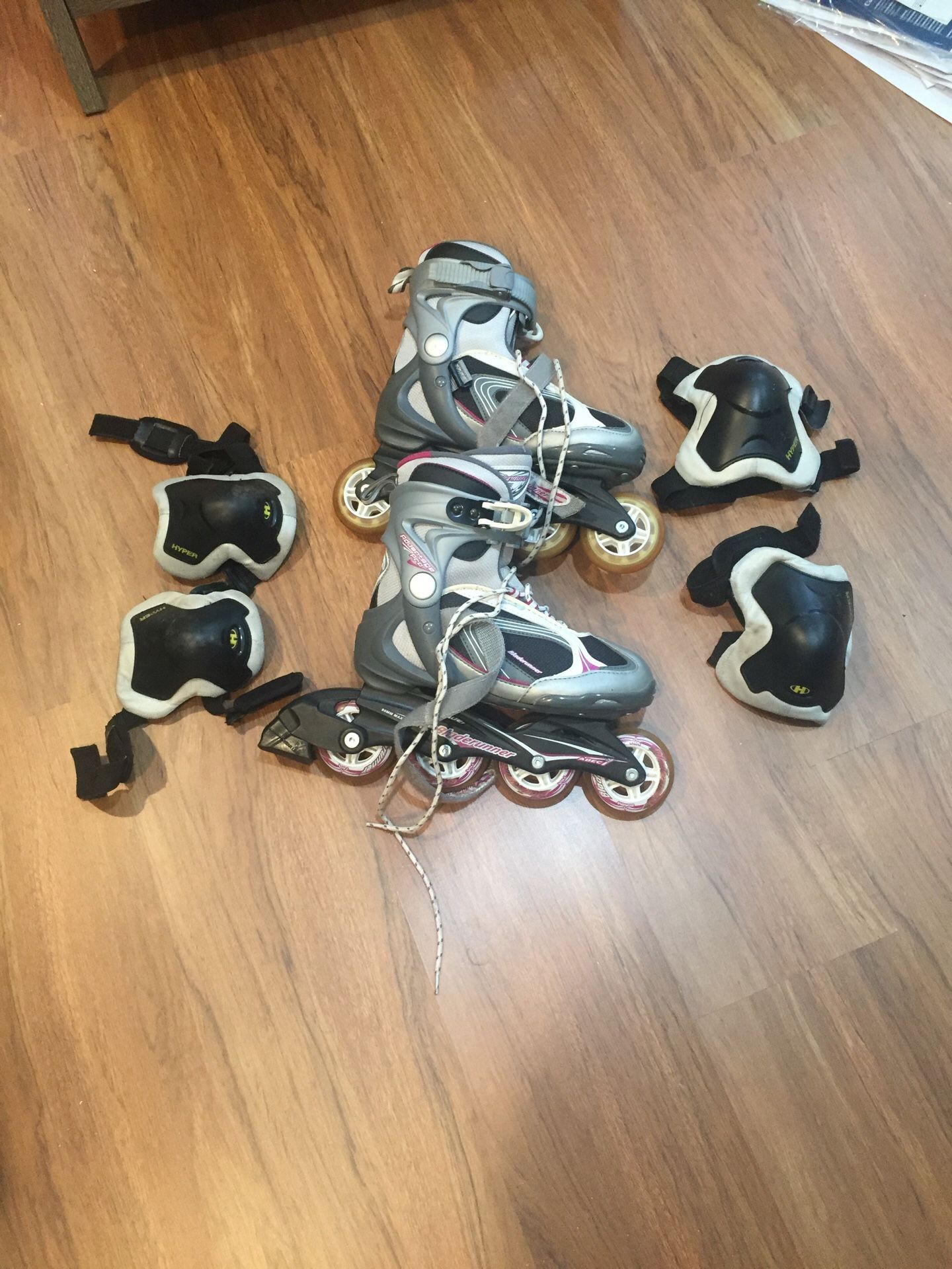 Size 6 rollerblades with knee and elbow pads