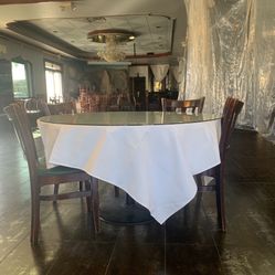Round table Seating 6-10 peoples. Come with counter top glass.