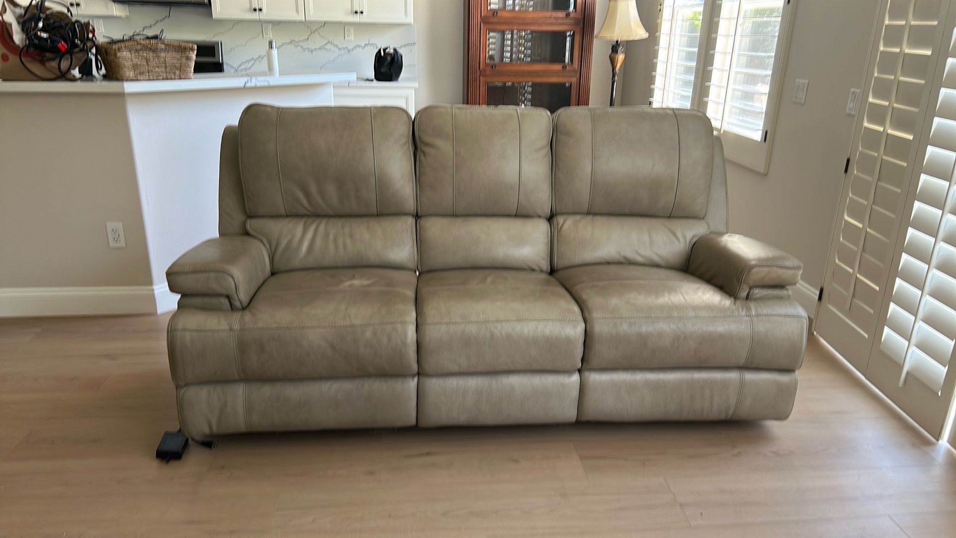 taking best offer Leather sofa and loveseat with electric recliners