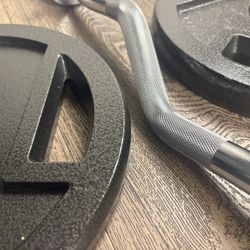 Beautiful BRAND NEW Curl Bar With Pair Of 25s And 10s   All BRAND NEW in cardboard tube/box.  Need Better Price$$$  I recommend that you look for used