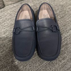 These are Salvatore Ferragamo blue Leather Loafers Size 9