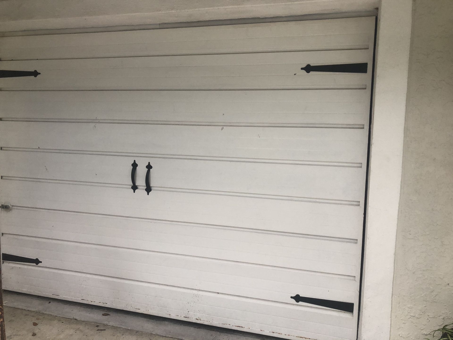 Single car garage door (78” tall 107” wide)