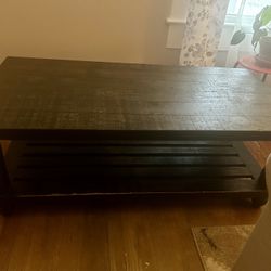 Black Wooden Coffee Table (from Ashley’s Furniture ).  Heavy & Sturdy.  Good Condition