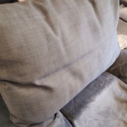 1 long gray Rectanglular pillow.