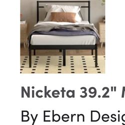 Twin bedframe still in the box. Never opened.  brand new.