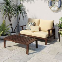 Outdoor Sofa with Cushions and a Coffee Table