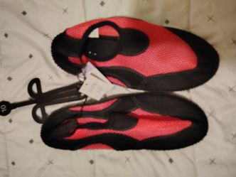 brand new Pink and black swim shoes