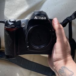 Nikon D70 body, multiple lenses, accessories, carry backpack