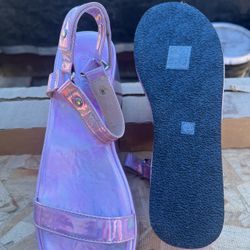 Woman, hard heels, sand