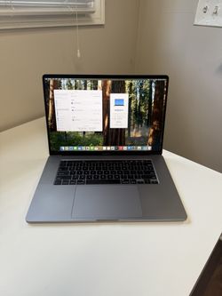 Apple 16” MacBook Pro 2019 Touch Bar Retina 2.3ghz Intel 8-Core i9 16gb RAM 1TB SSD macOS Sequoia 4GB Dedicated Graphics Card AMD Radeon Pro 5500M