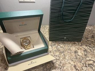 Rolex - Gold & White Oyster