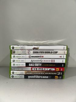 8 xbox 360 games including GTA 4