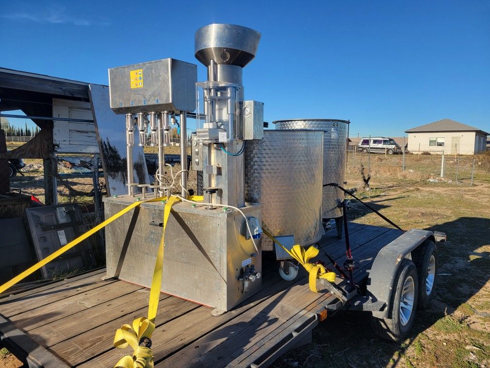 Wine bottling machine and large fermenting vats