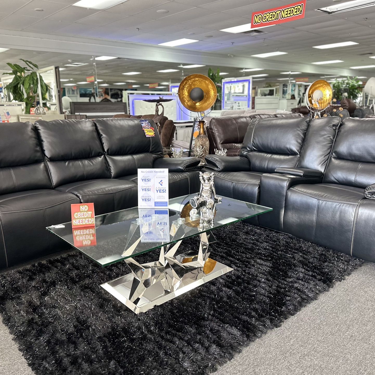 Beautiful, Black, Leather Power Head And Foot Reclining Sofa, Set On Sale Now With A Free Coffee Table And Rug
