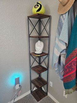 Corner shelving stand