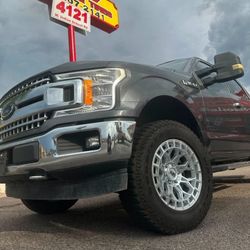 18x9 XM Rims And Tires 275/65/18 AT