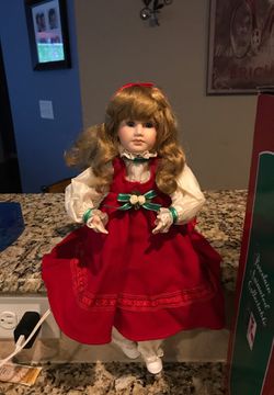 Vintage porcelain animated collectible doll . Ready for X-mas works great clean