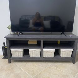 TV  55inch  with table and baskets