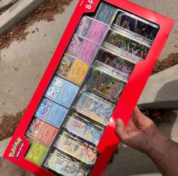 Prismatic Evolutions Mini Tins