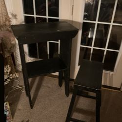 A Nice Shelf With A Matching Stool For The Bar