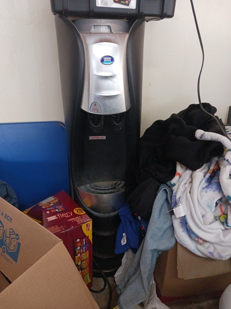 Nestle Water Cooler Dispenser For 5 Gallon Jugs.