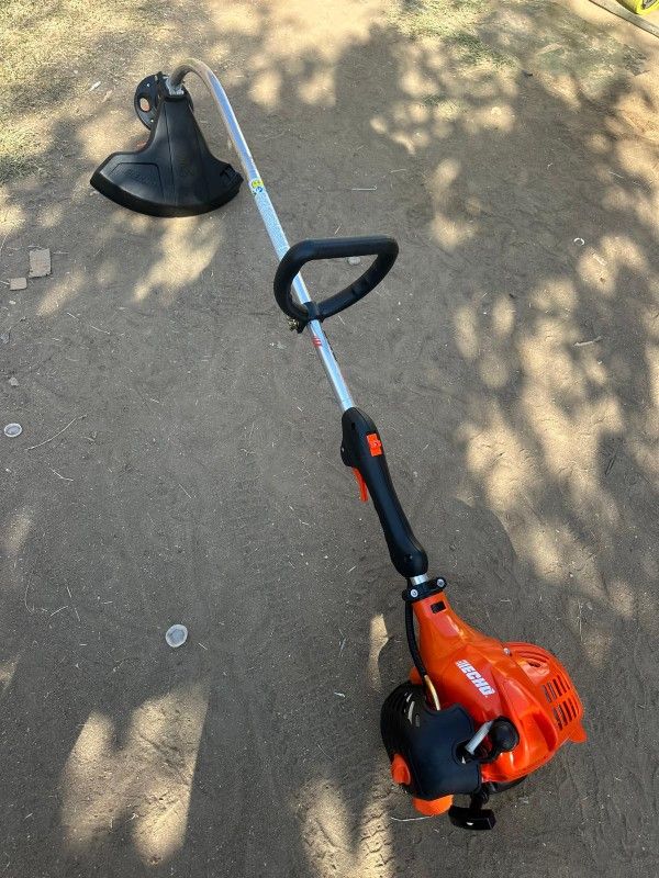 21.2 cc Gas 2-Stroke Curved Shaft String Trimmer with Rapid-Loader Trimmer Head