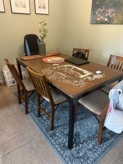 Brown wood table and 6 chairs