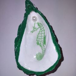 Seahorse print decoupaged onto oyster 