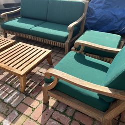 Smith and Hawken Teak Outdoor Sofa Seating Furniture with Matching green seat cushions   Located in concord  Recently cleaned and teak oiled  Teak woo