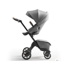 Stokke xplory toddler ride along and rain/wind cover.